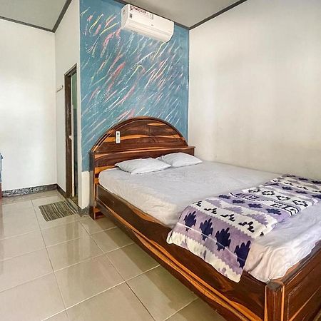 Ekas Beach Guesthouse Mitra Reddoorz Bagian luar foto