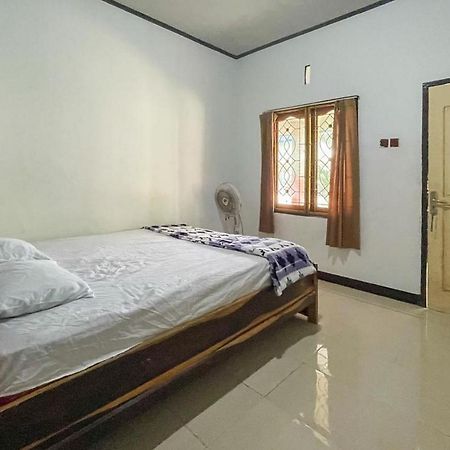 Ekas Beach Guesthouse Mitra Reddoorz Bagian luar foto