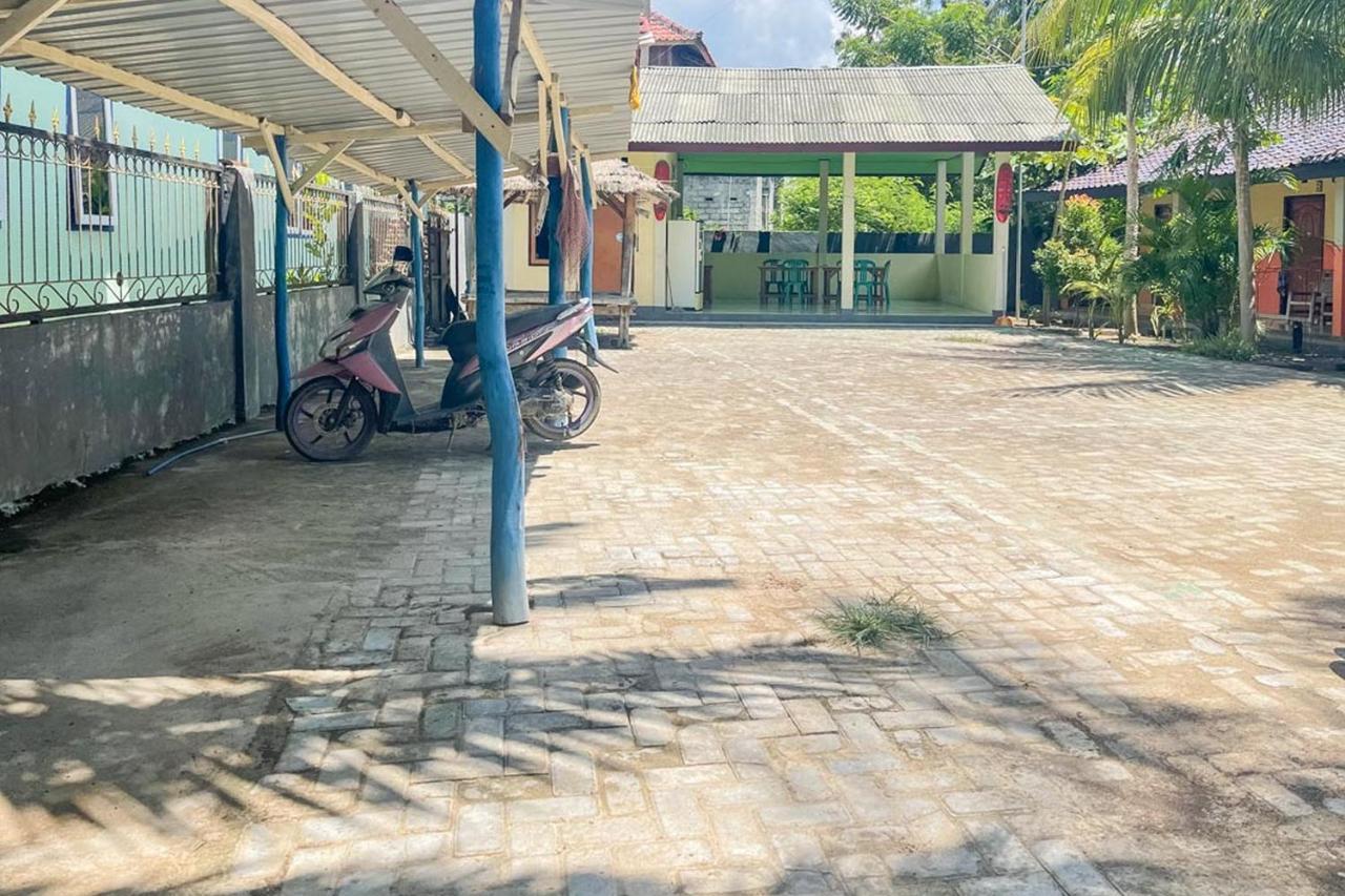 Ekas Beach Guesthouse Mitra Reddoorz Bagian luar foto