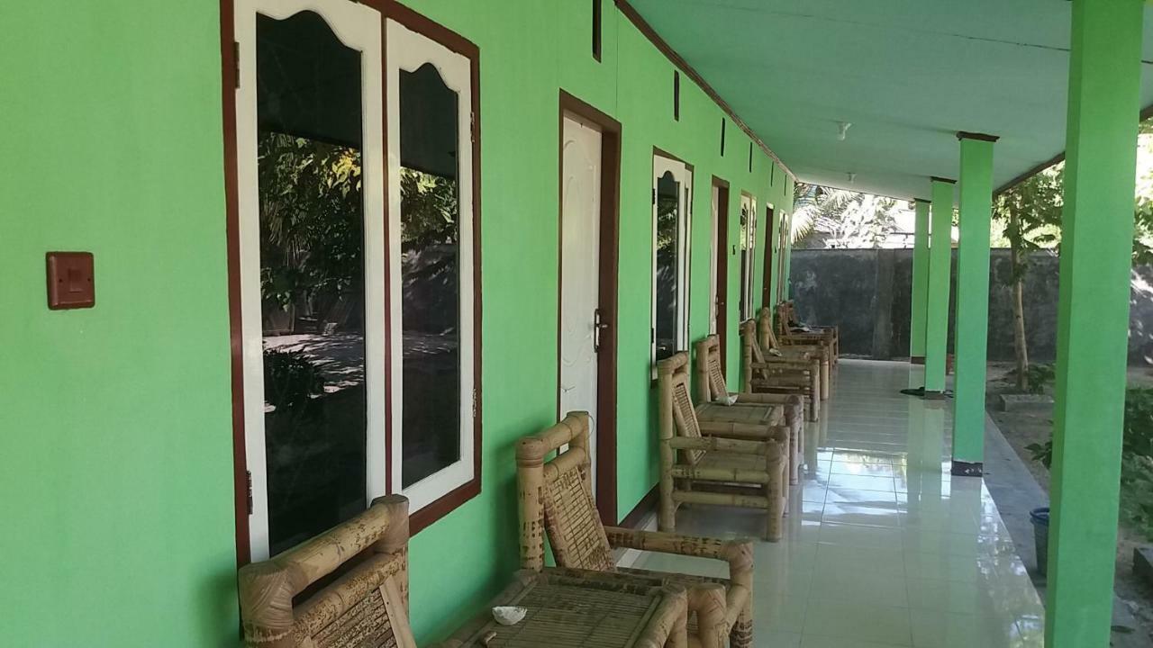 Ekas Beach Guesthouse Mitra Reddoorz Bagian luar foto